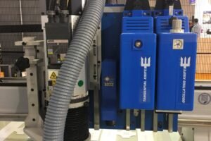 AXYZ International demonstrates triple-head Trident finishing system at FESPA 2018